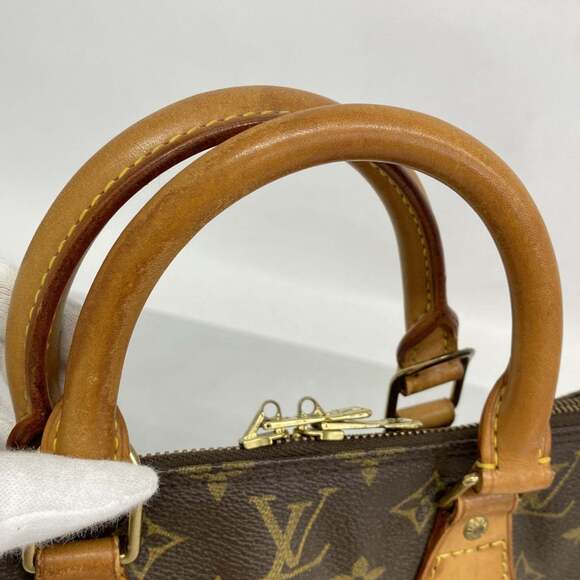 LOUIS VUITTON Brown Monogram Alma Bag - Picture 9 of 10